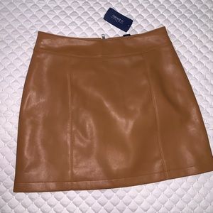 New, with tags! Faux leather tan skirt